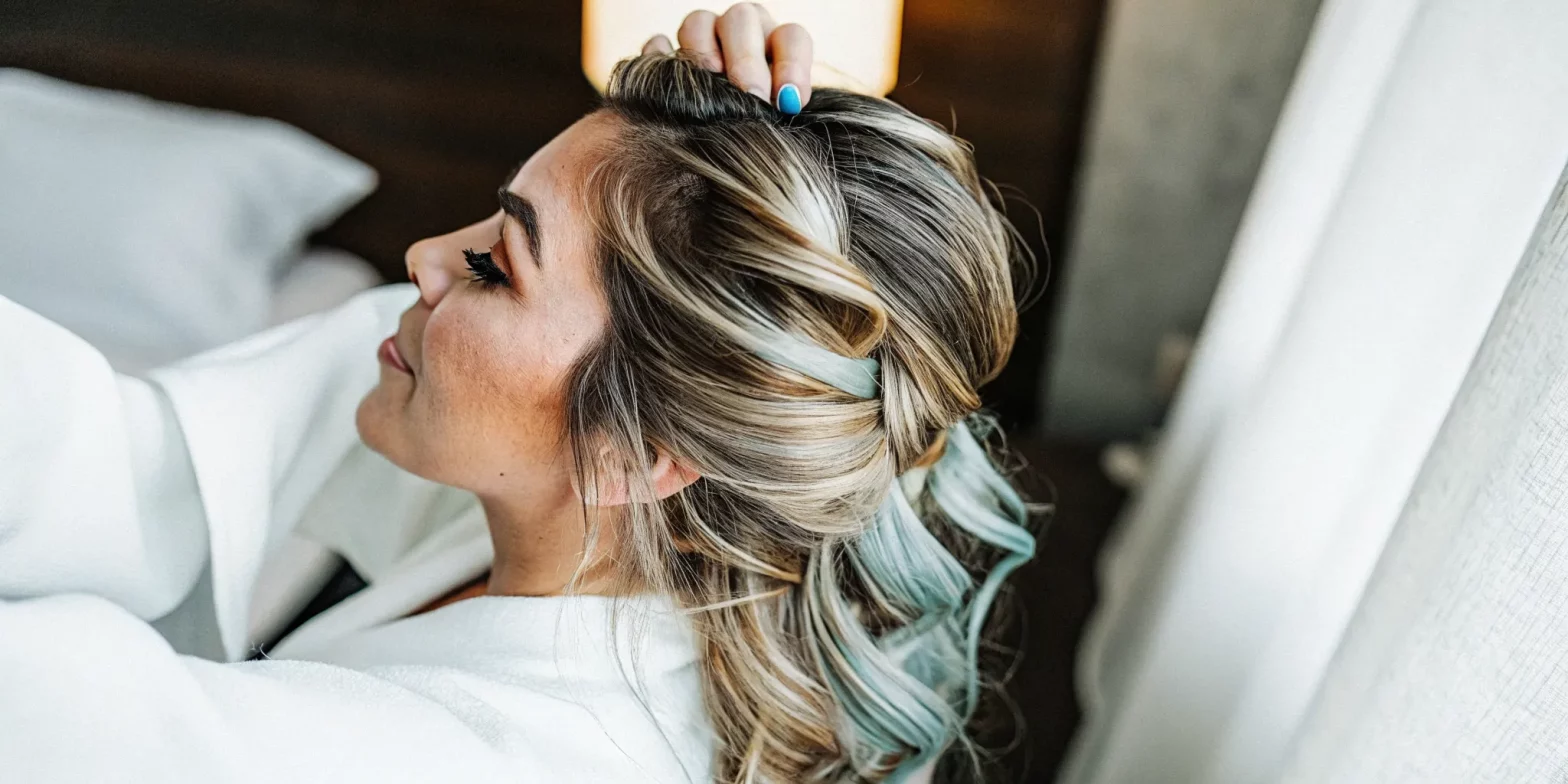 Woman with healthy blonde hair, cool-toned and shiny, no brassiness